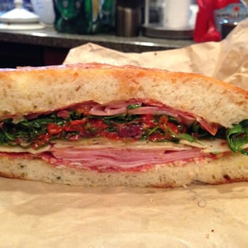 The Flying Fig signature dishes Smoked Turkey Sandwich
Elotes
Pan Roasted Pork Loin